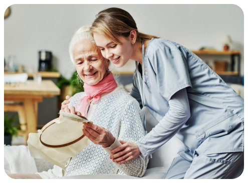 caregiver hugging senior